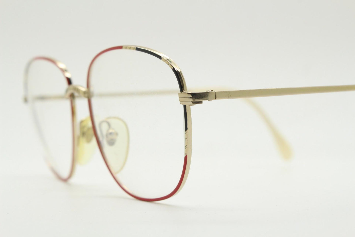 80s vintage slender gold metal frame eye glasses. Straightforward design with red and black highlights. Optical frame. Prescription. 90s NOS