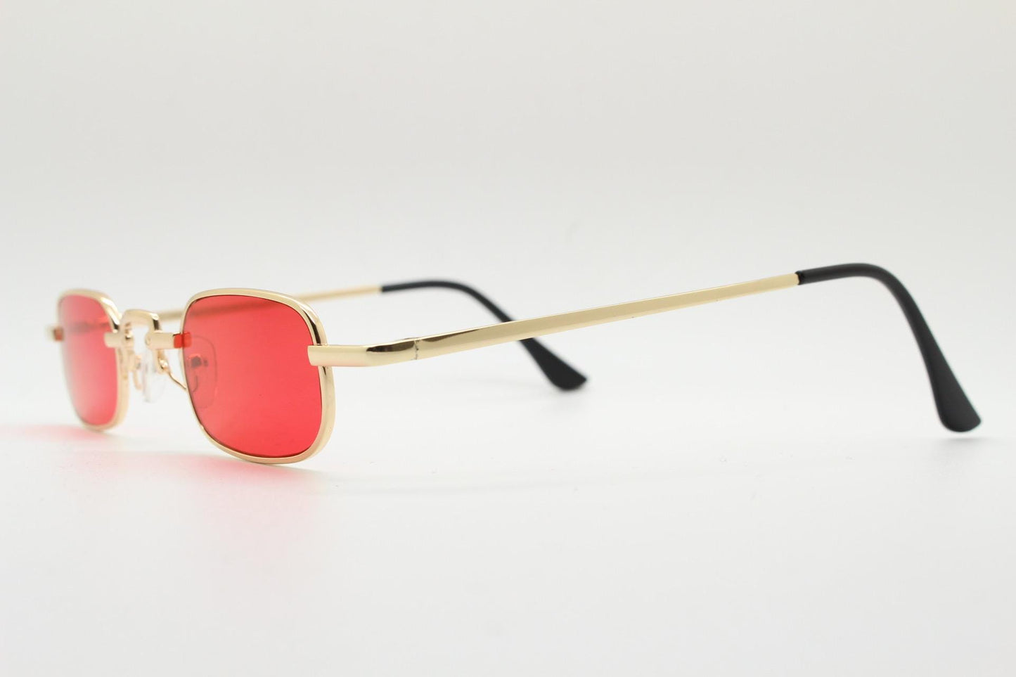 90s vintage small rectangular sunglasses. Imposing minimal gold metal victorian style frame with deep red lenses. Unused BNWT