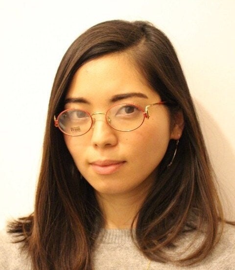 Gianfranco Ferre 90s vintage oval eye glasses made in Italy. Red and gold metal tech design optical frame. Prescription RX. NOS