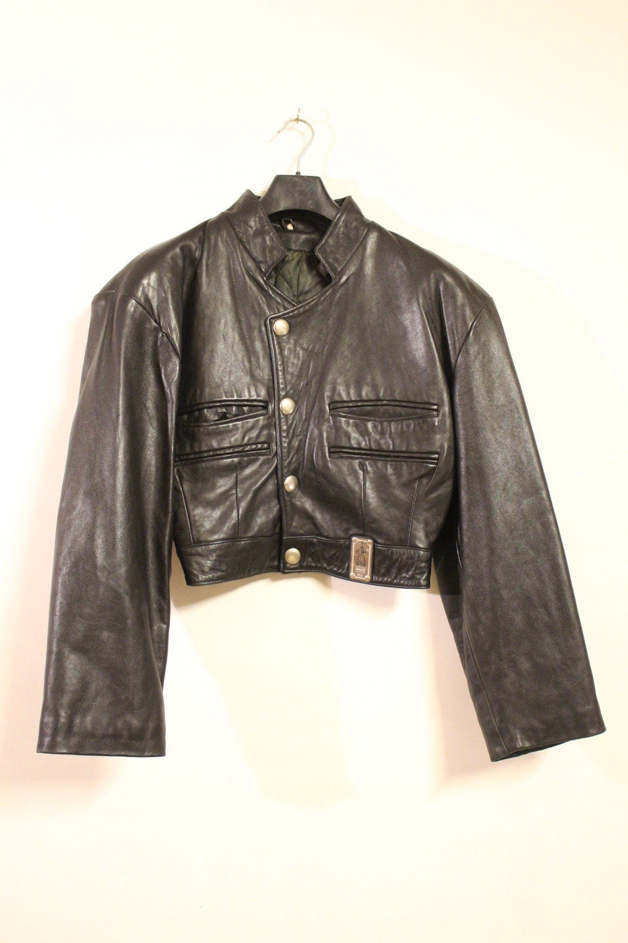 Hi-Tech 90s vintage black leather jacket. Made in England. Cropped oversized blouson design. Double breasted with chrome metal