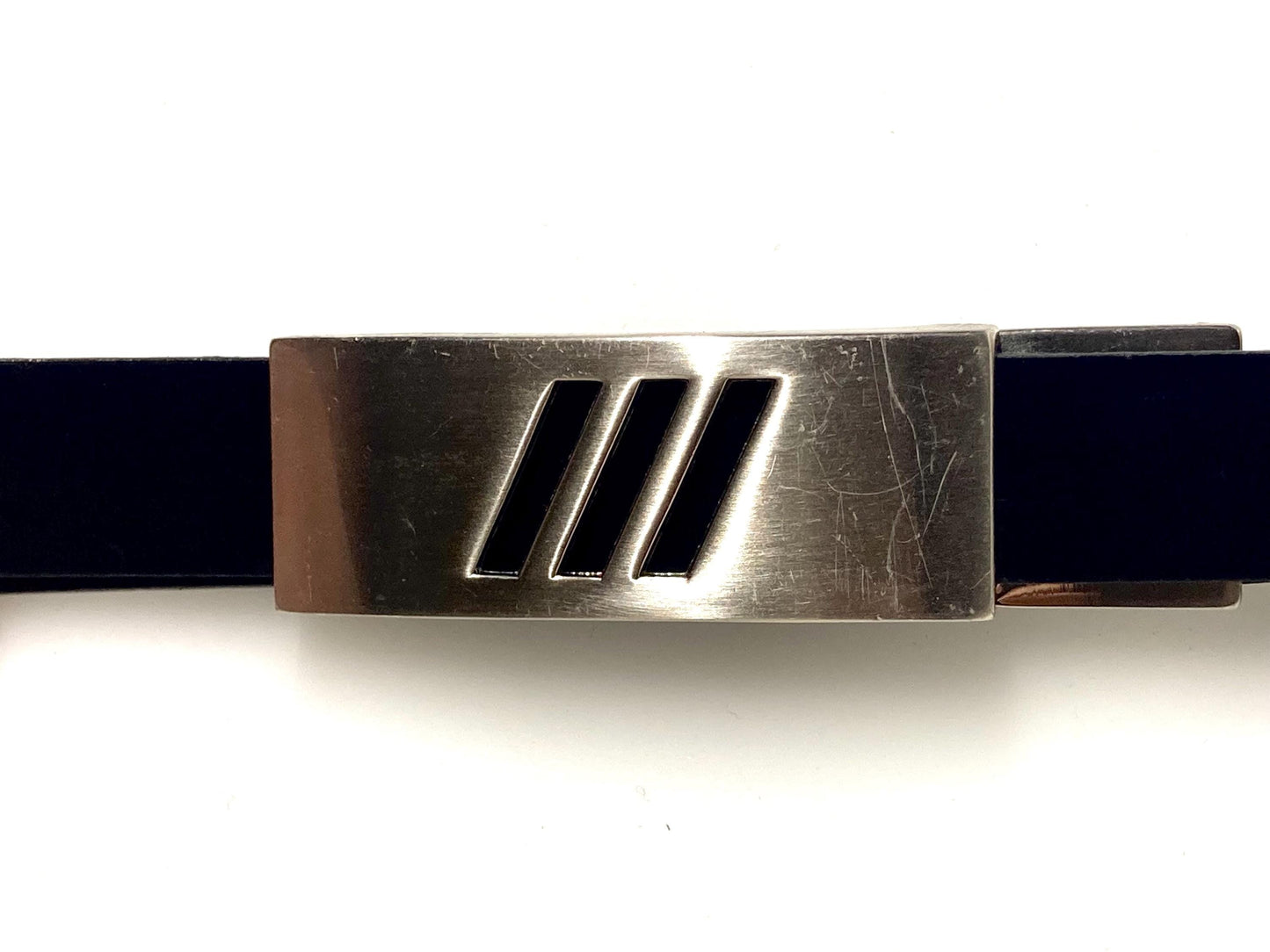 90s vintage smart trouser belt. Thick eco vinyl in black shiny finish with steel buckle with cutouts. Seamless no holes design. Mens NOS