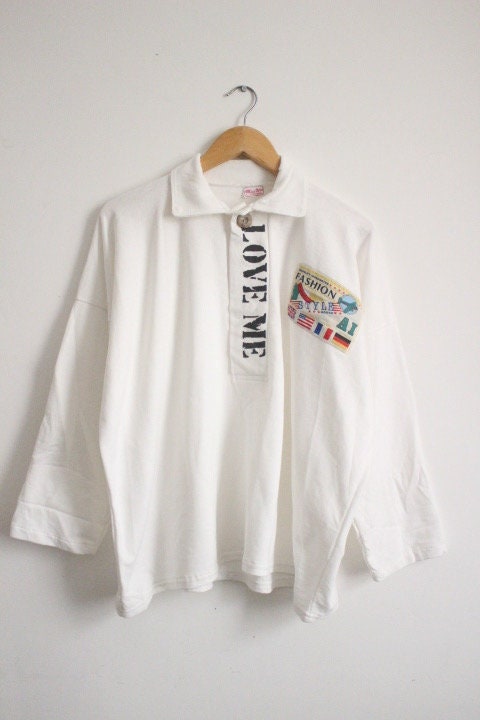 80s Vintage oversized polo shirt with 'LOVE ME' graphic print. Crop sleeve jumper. Unisex sweatshirt. Fashion grail sweater. NOS pullover