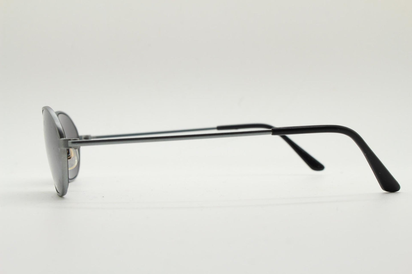 90s vintage small angular oval bug eye sunglasses. Minimal brushed satin finish frame with silver mirror lenses. Y2K. 2000s. Unworn NOS