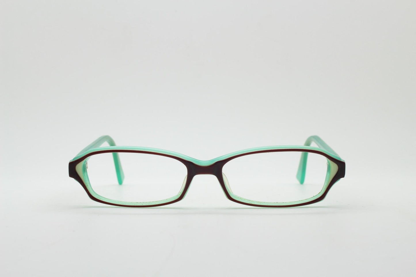 Francois Pinton Paris rectangular cat eye glasses made in Italy. Womens vibrant green acetate optical frames with brown front. Vintage