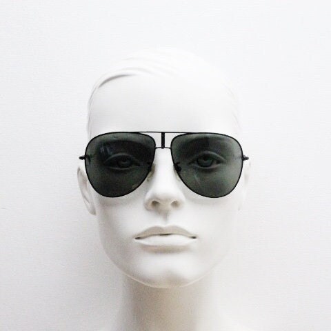 Loewe vintage aviator sunglasses in a tall black gloss frame with dark green lenses. Mens large teardrop pilot aviators. Y2K New Old Stock