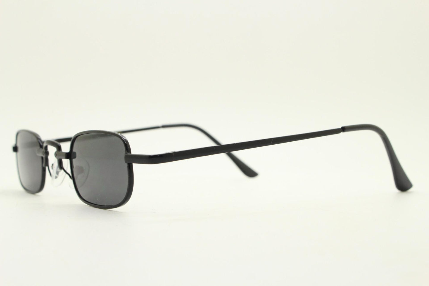 90s vintage small rectangular sunglasses. Imposing minimal all black gloss victorian style frame with dark lenses. Steampunk. Unused NOS