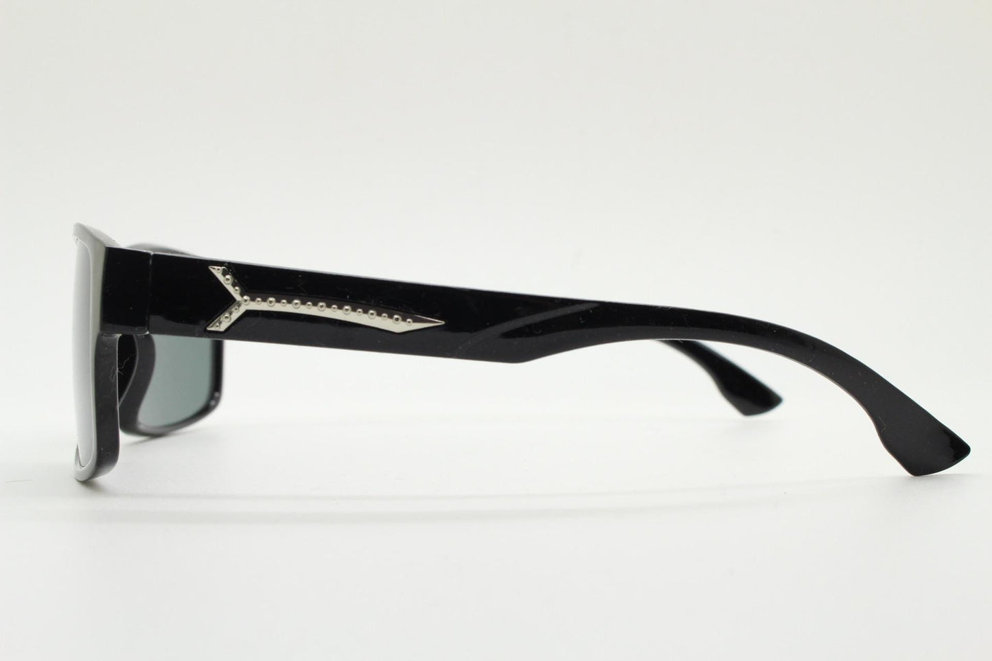 Y2K vintage sharp rectangular sunglasses. Large curved black gloss frame with dark green lenses and silver arrow arm crests. NOS