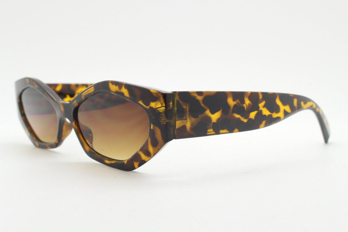 Vintage 90s low profile hexagon sunglasses. Honey tortoise sharp angled 6 sided frame with full height arms and amber lenses. Unused  BNWT