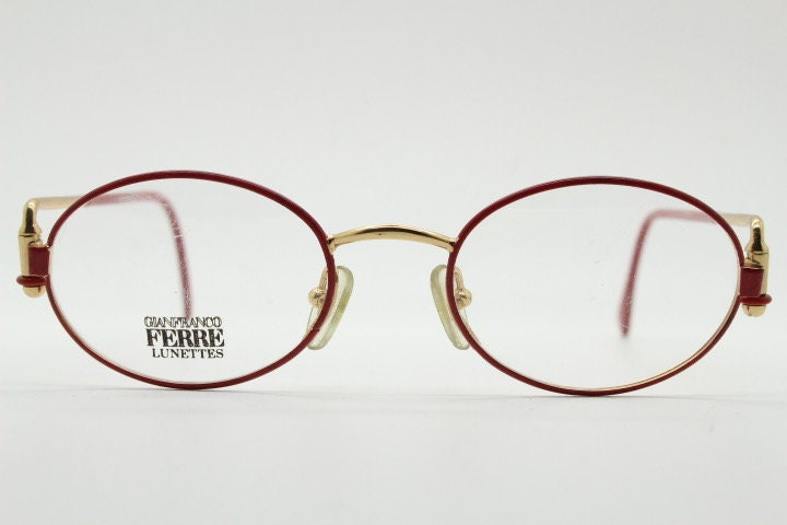 Gianfranco Ferre 90s vintage oval eye glasses made in Italy. Red and gold metal tech design optical frame. Prescription RX. NOS