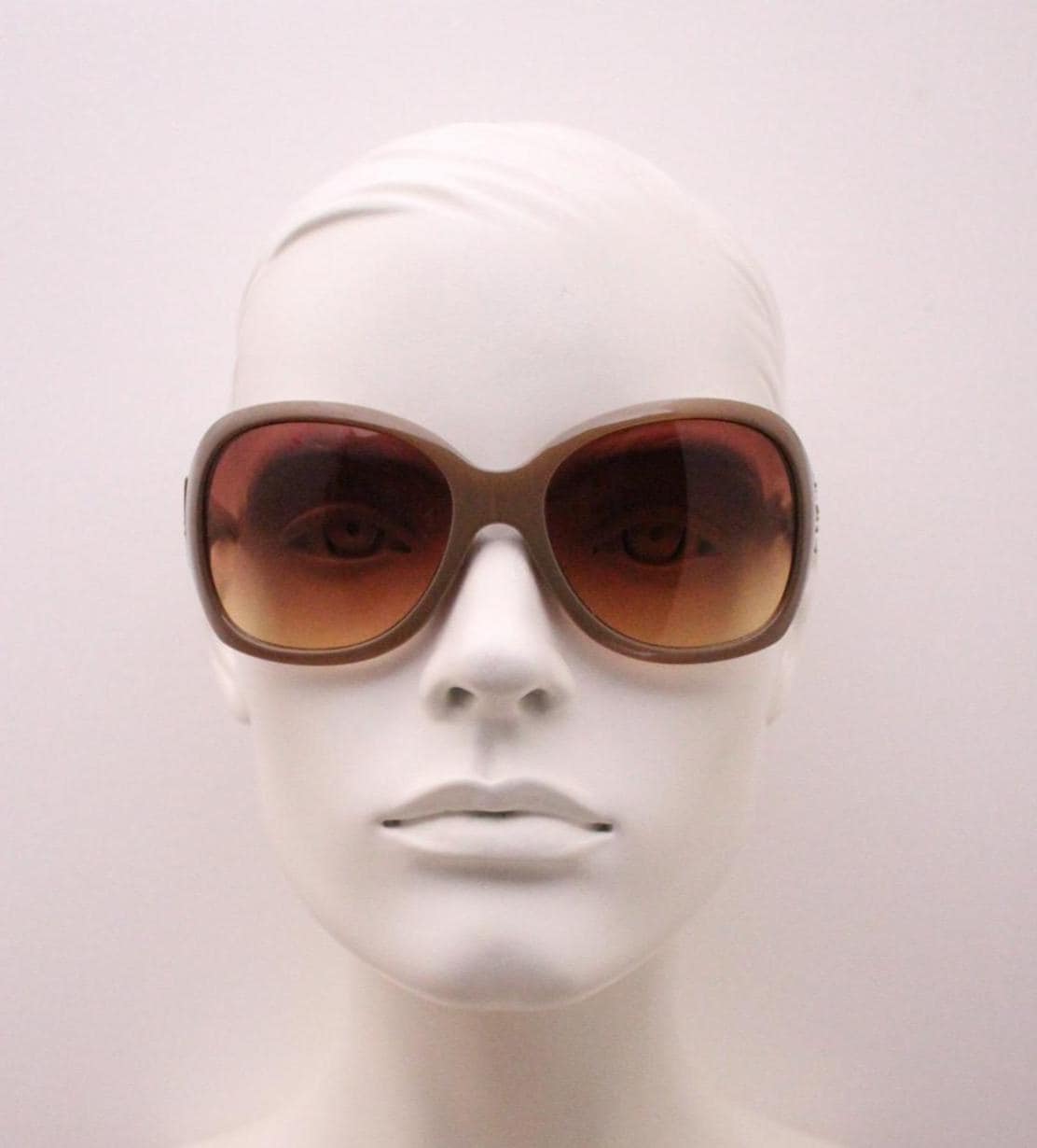 Y2K vintage big beige sunglasses. Oversized 70s design with curving close fit and graduating Havana brown lenses. 2000s bug eye