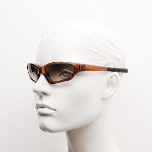 90s vintage sports shield sunglasses. All brown gloss aerodynamic wraparound with light tone lenses. 2000's NOS in small size