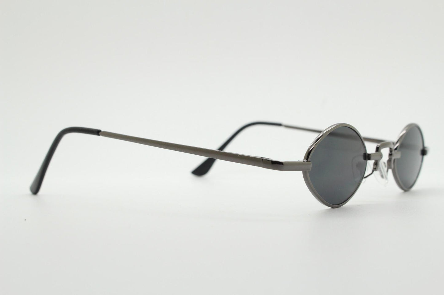 90s vintage small oval sunglasses. Imposing minimal gunmetal grey metal victorian style frame with black lenses. Steampunk. Unused BNWT