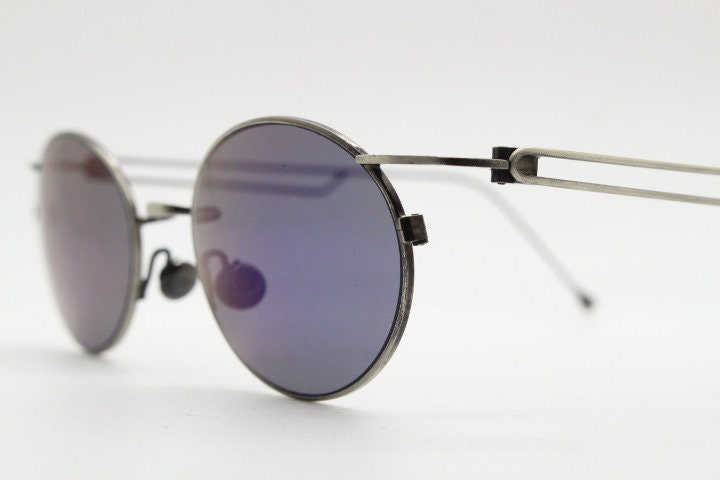 90s vintage oval sunglasses. Refined 'industrial tech' style brushed bronze metal frame with cool blue mirror lenses. Unused NOS