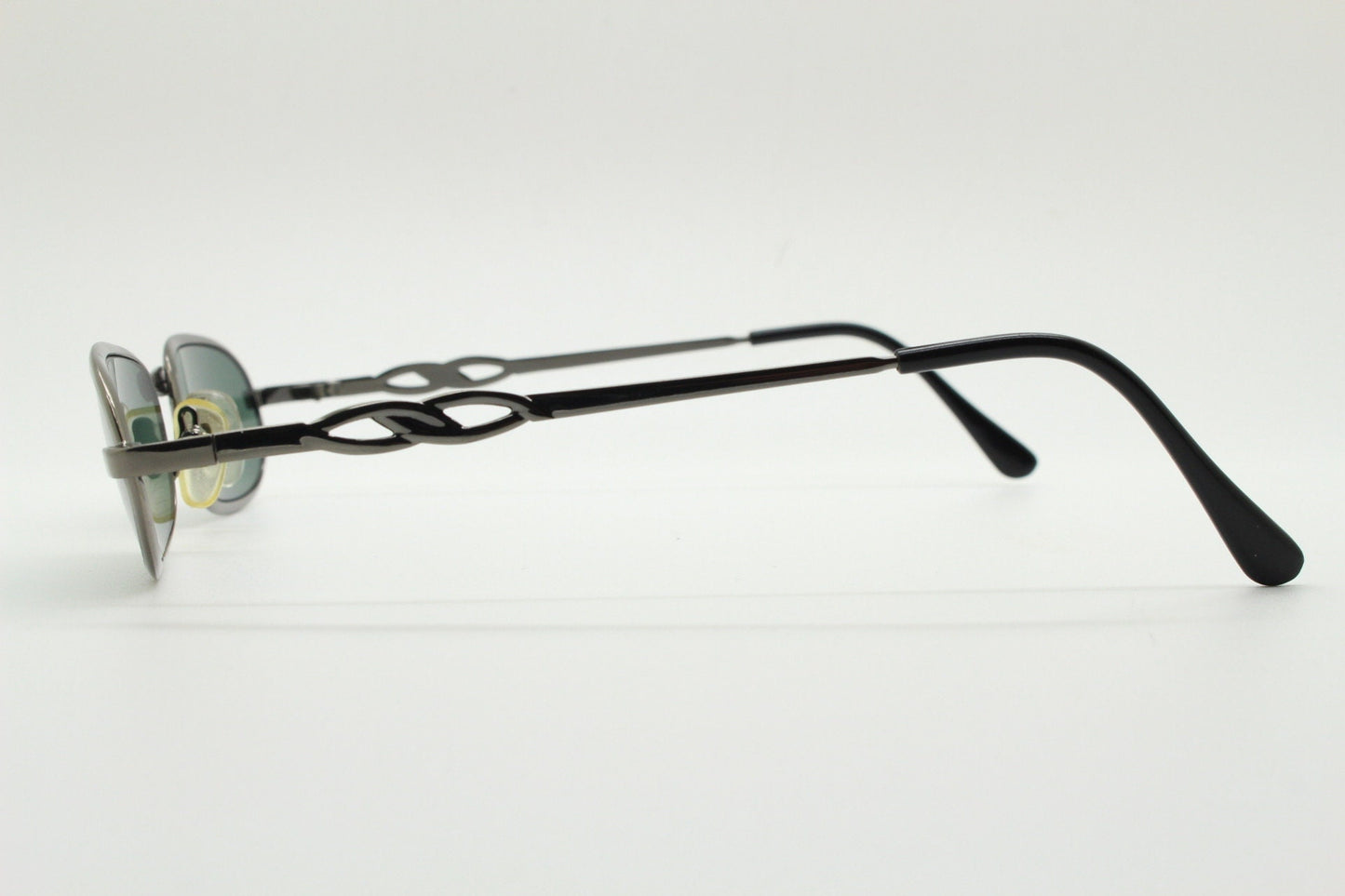 90s vintage oval solid metal sunglasses. Minimal gunmetal grey chrome frame with dark green lenses. Steampunk. Micro. Unused NOS