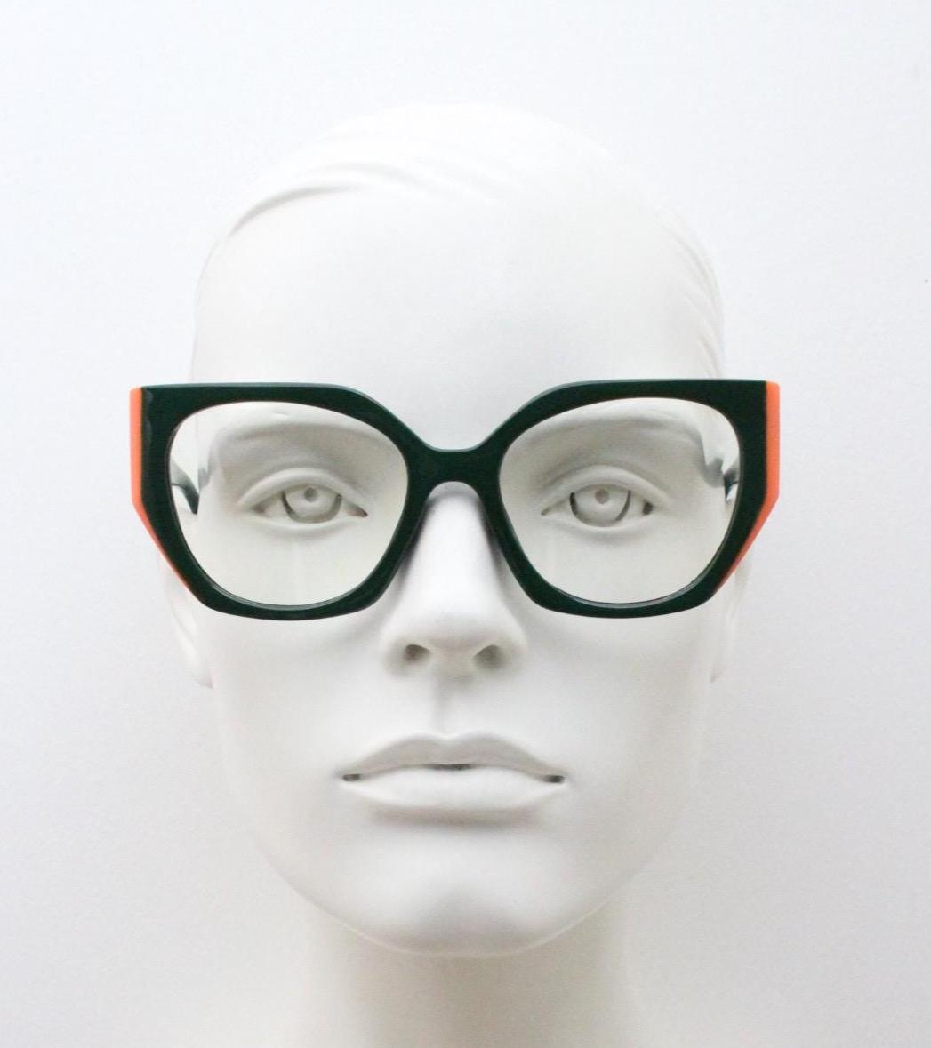 Sharp angled flat top  cat eye glasses. Refined green cateye optical frame with bright orange side sections. Prescription RX Spectacles