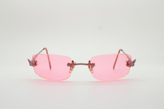 Y2K vintage rimless rectangular sunglasses. Frameless 2000's all pink design with supercute metal butterfly corners. 00's NOS