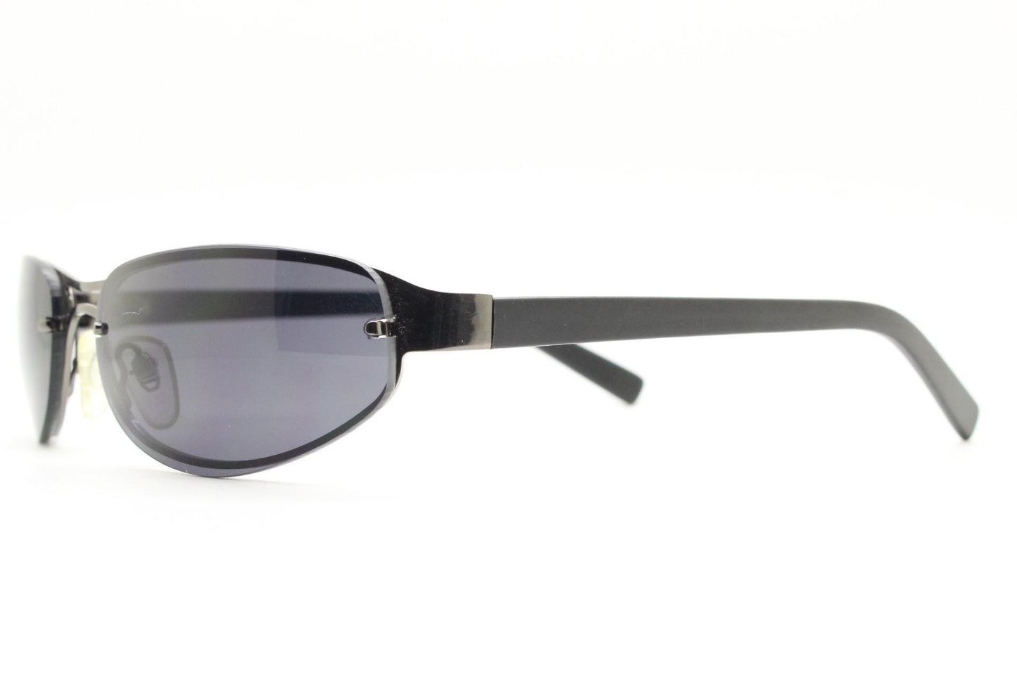Y2K vintage small bug eye oval sunglasses. Gunmetal grey chrome metal frame with curved bug eye lenses and matt black arms. 2000's NOS