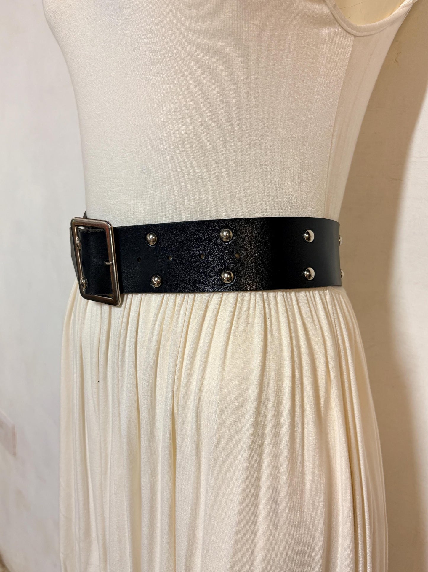 Y2k vintage womens dress belt with flat silver buckle and 2 rows of round domed metal studs. Thick black vinyl 2000s NOS