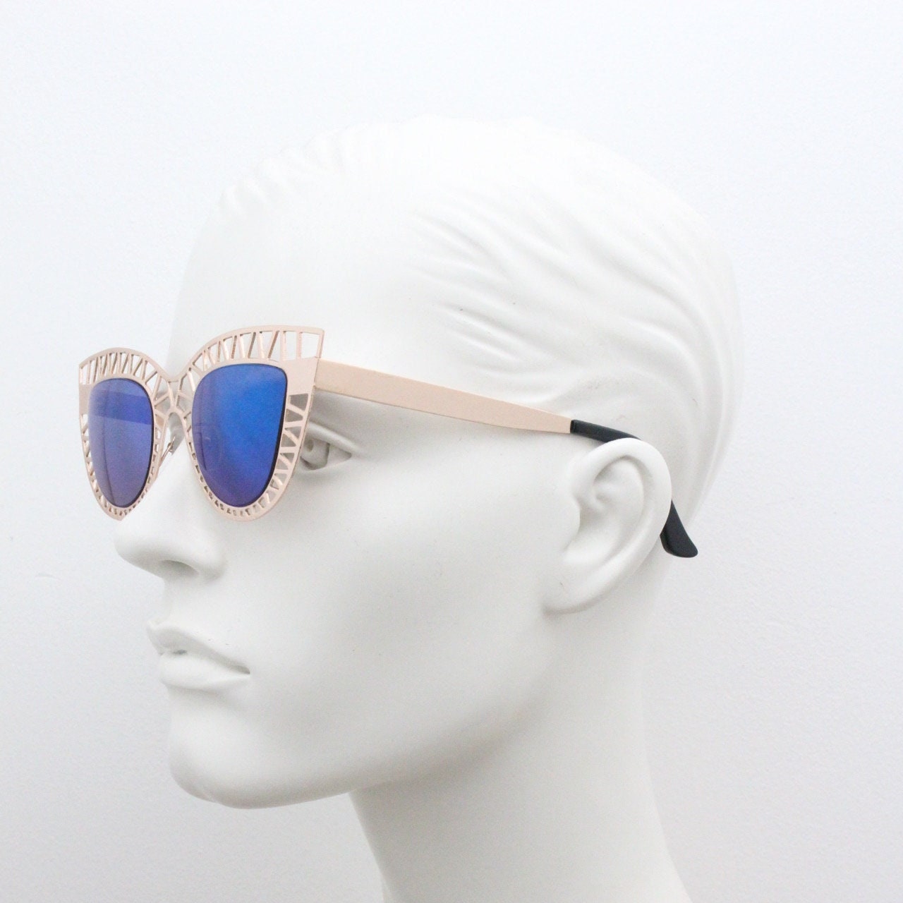 Y2K vintage metal cat eye sunglasses. Women's extraordinary gold cut out lattice scaffold cateye frame with blue mirror lenses. 2000s. BNWT