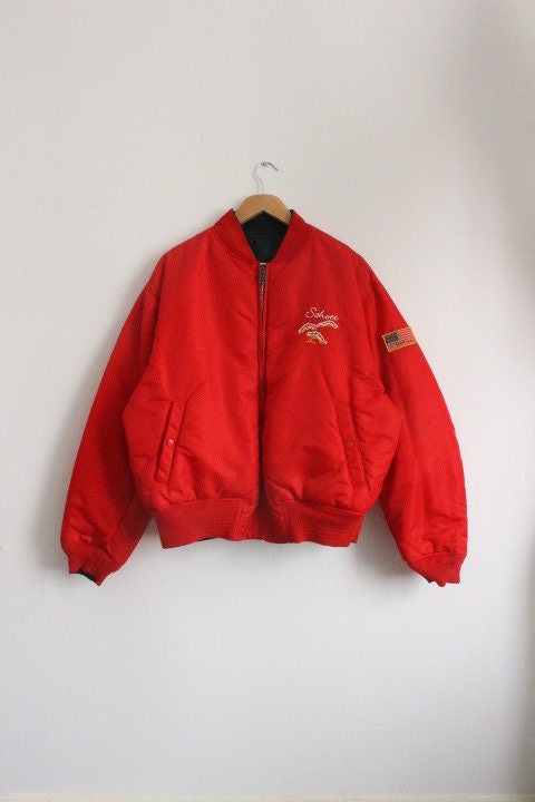 Schott NYC vintage reversible bomber jacket. Big spell out logo back in blue with red reverse side featuring white eagle. Flying MA 1.