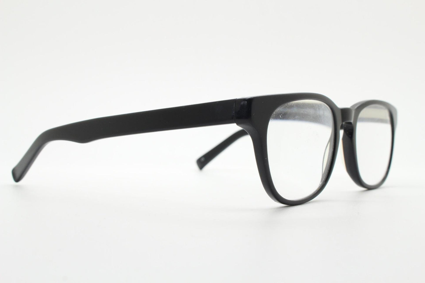 Andi Black rectangular horn rim eye glasses. Black gloss 40s design acetate optical frames with keyhole bridge. Prescription RX spectacles