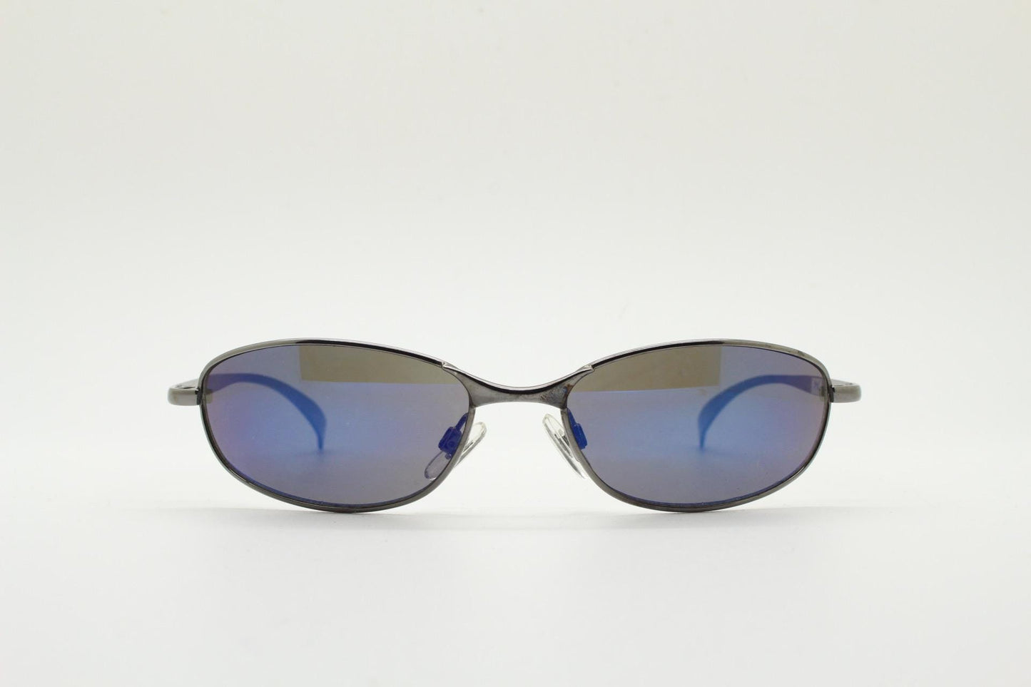 90s vintage oval small bug eye sunglasses. Curved grey chrome finish solid metal frame with blackout mirror lenses. Quality NOS