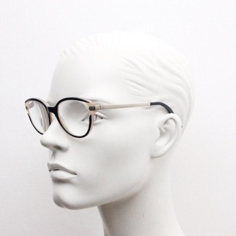 Nina Ricci vintage cat eye glasses. Yellow crystal and black acetate cateye optical frames gold metal arms. Womens prescription spectacles