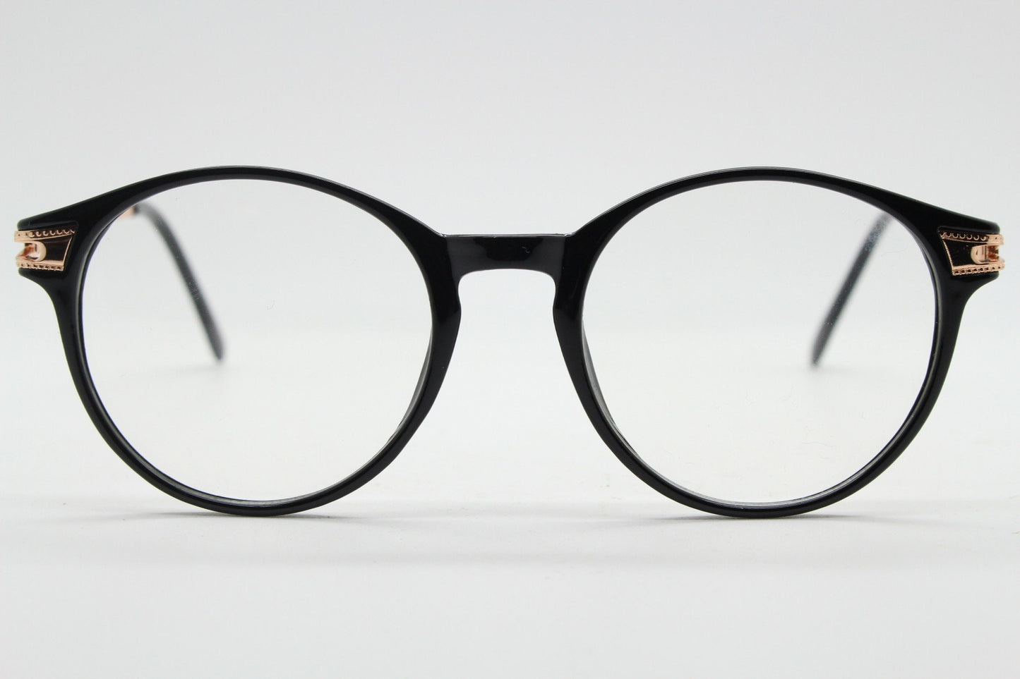 90s vintage round glasses with embossed gold  arms. Black 40s, 50s style prescription optical frames. Clear lens eyeglasses. RX spectacles