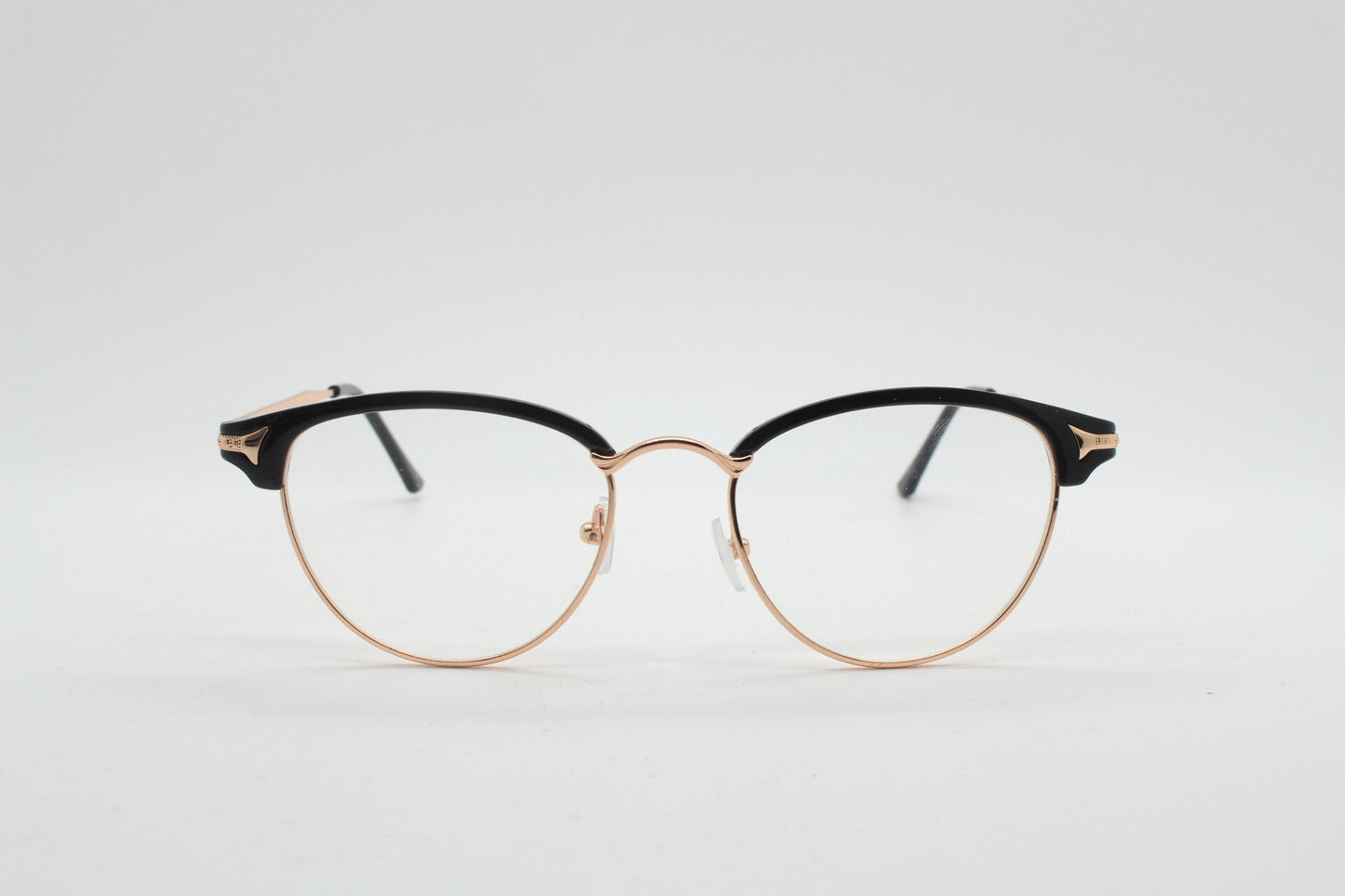 90s vintage browline cat eye glasses. Black gloss and gold half frame eyeglasses. 50s, 60s cateye design with clear lenses. NOS