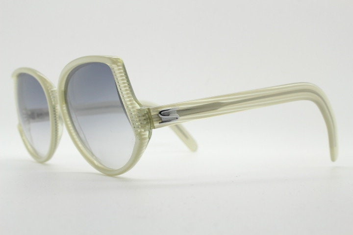 Silhouette 70s vintage abstract upside down sunglasses model 3018 made in Austria. Dynamic grey pearlised acetate frame with white stripes