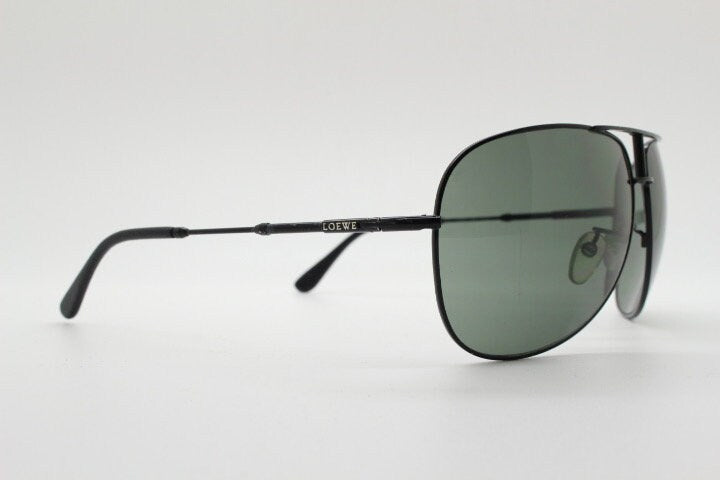 Loewe vintage aviator sunglasses in a tall black gloss frame with dark green lenses. Mens large teardrop pilot aviators. Y2K New Old Stock