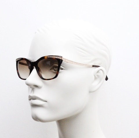 Borsalino cat eye sunglasses made in Italy model 250. Womens Tortoise acetate frame with dramatic diamante golden arms. Rhinestone cateye
