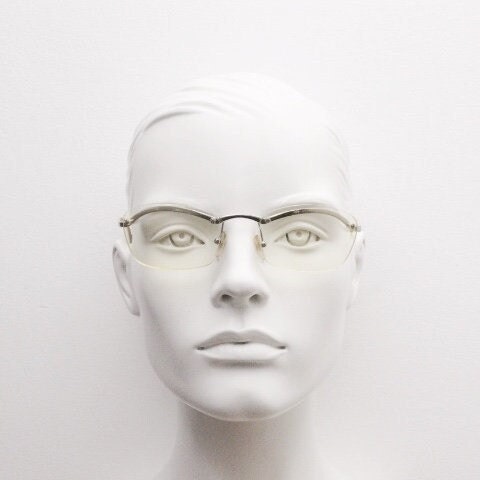 Y2K vintage half frame extra light tone yellow sunglasses with satin alloy brow line. Minimalistic 2000's wrap around design. 00's NOS