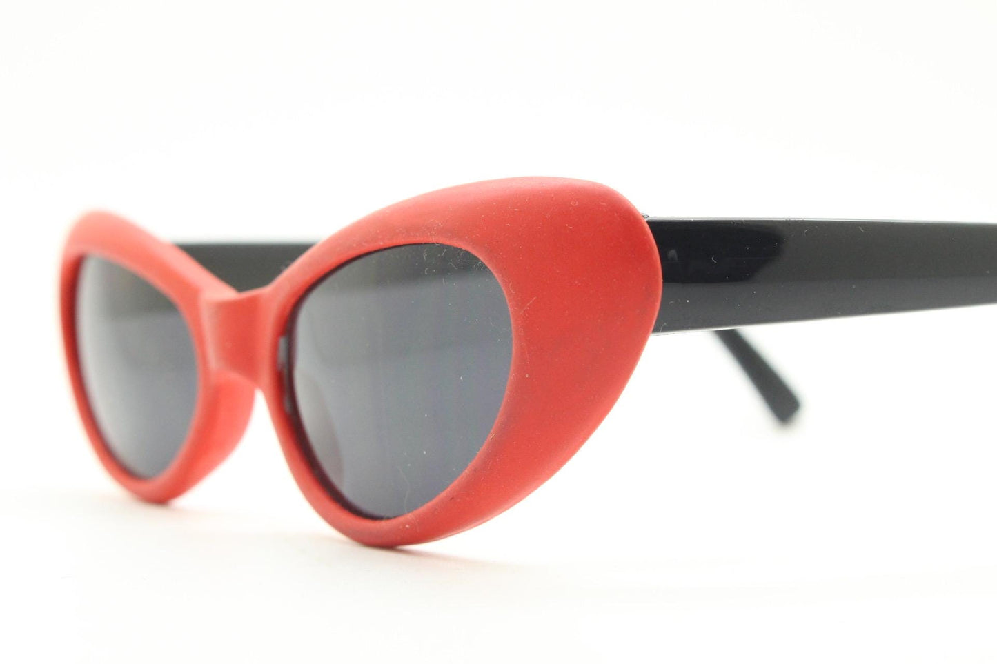 Vintage 80s oval cat eye sunglasses. Dynamic red rubber front with black gloss arms. Hyper real cosplay cateye. New wave punk