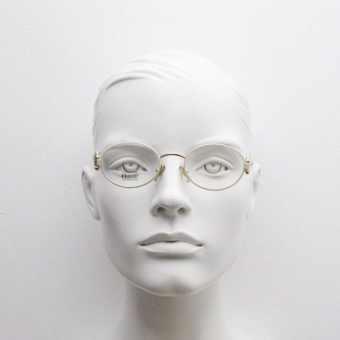 Gianfranco Ferre 90s vintage oval eye glasses made in Italy. White and gold metal tech design optical frame. Prescription RX spectacles. NOS