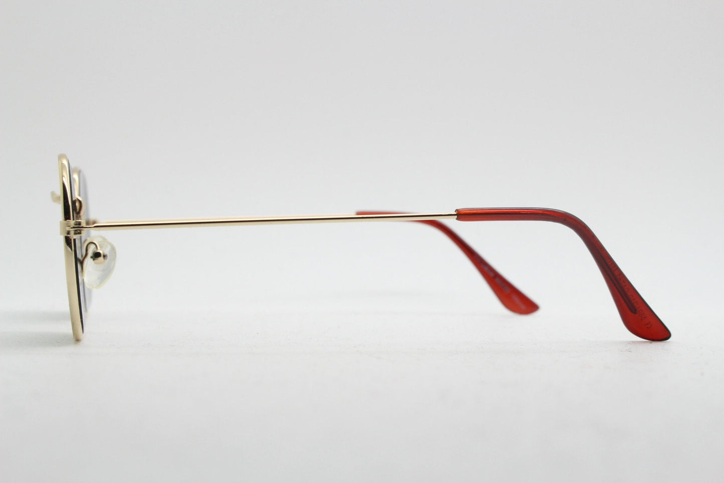 90s vintage hexagon sunglasses. Low profile slim gold 60s design frame with flat green lenses Octagon