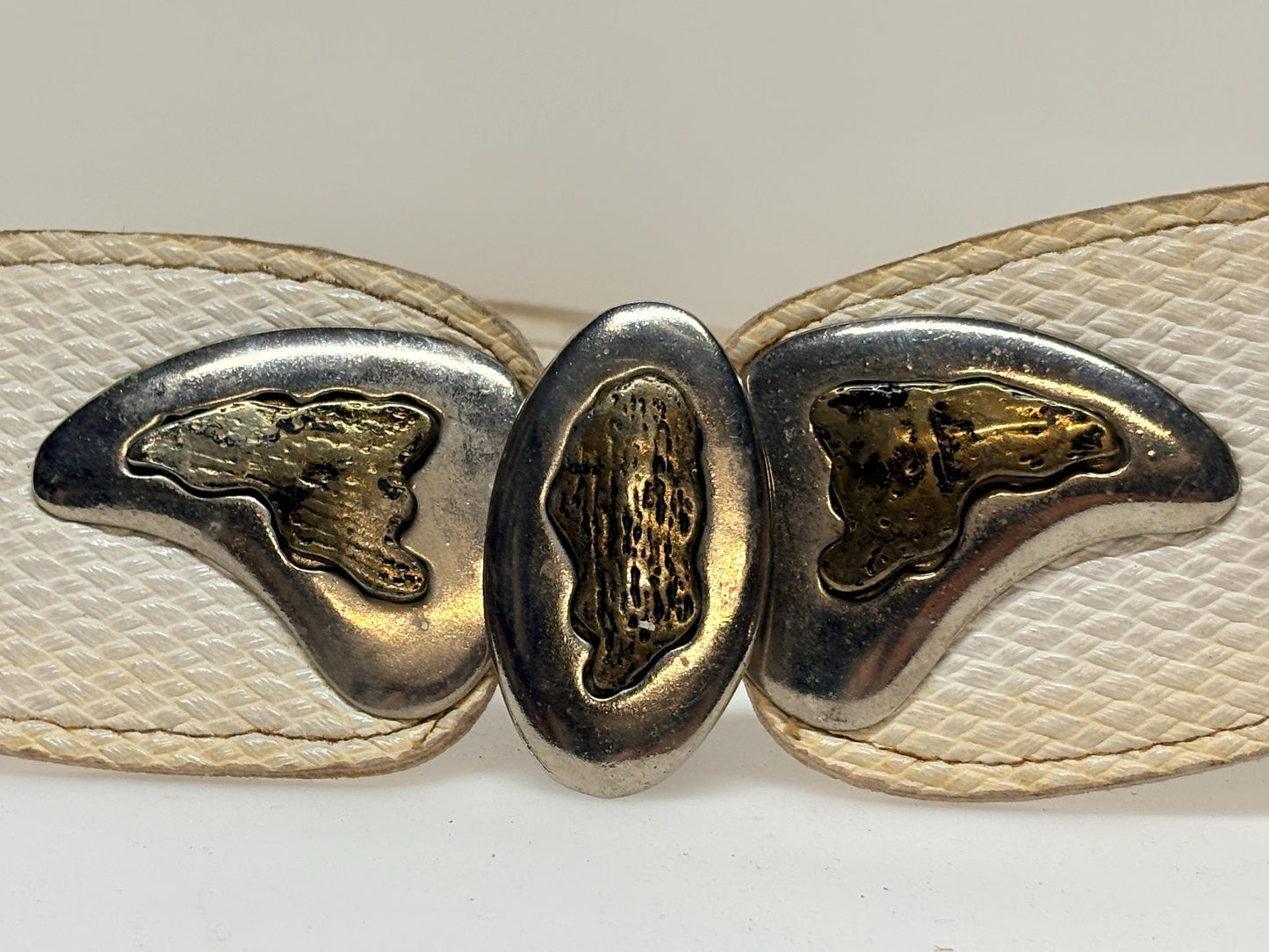 80s vintage womens white textured vinyl flattering dress belt with substantial butterfly shape metal buckle with brass implants
