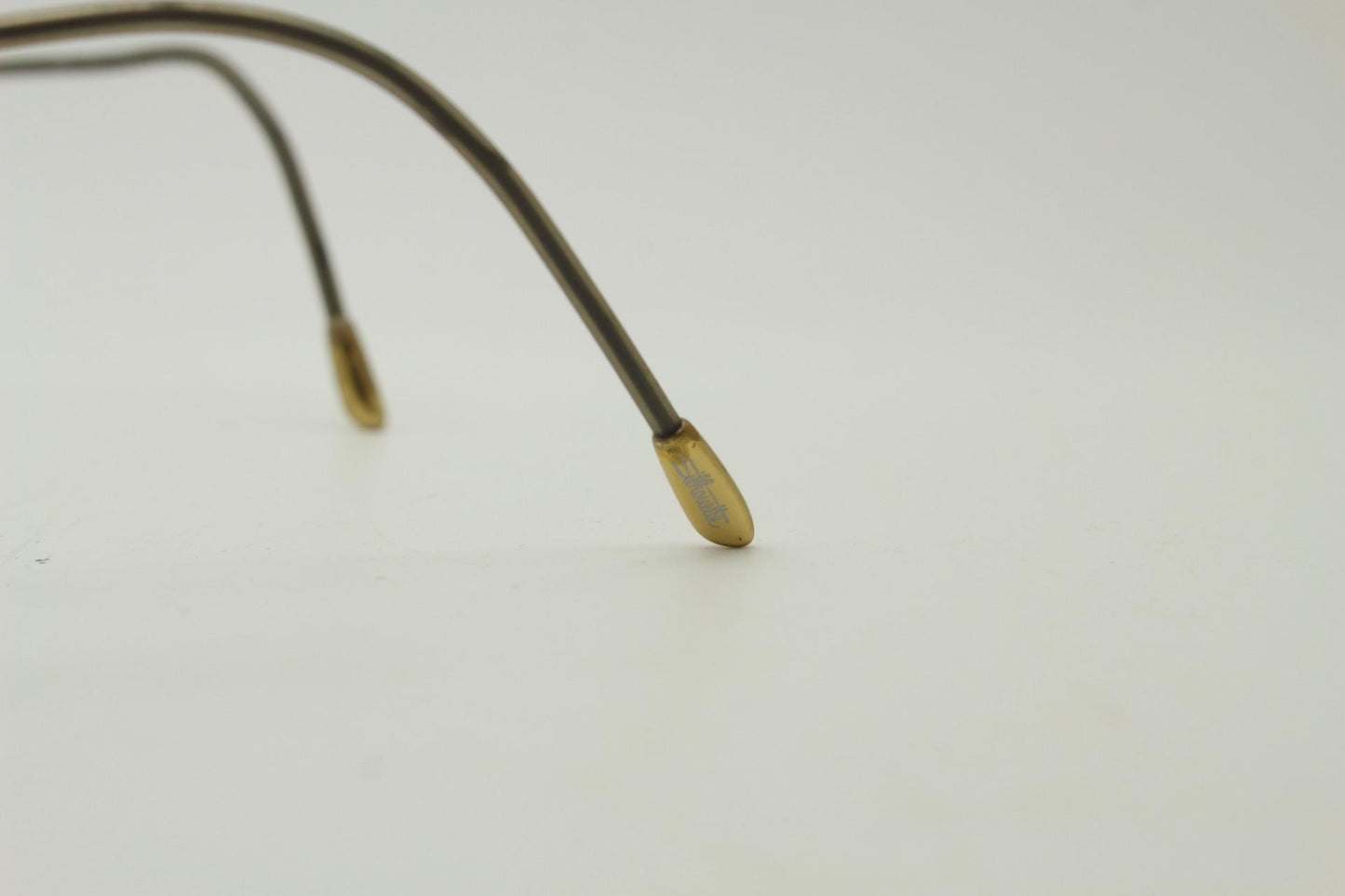 Silhouette vintage oval frameless eye glasses made in Austria. Minimal lightweight satin bronze optical frame. Prescription spectacles