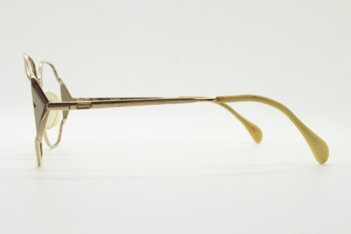 Silhouette 70s vintage octagon eye glasses. Womens sophisticated angular golden optical frame with white detail. Prescription eyeglasses. Rx