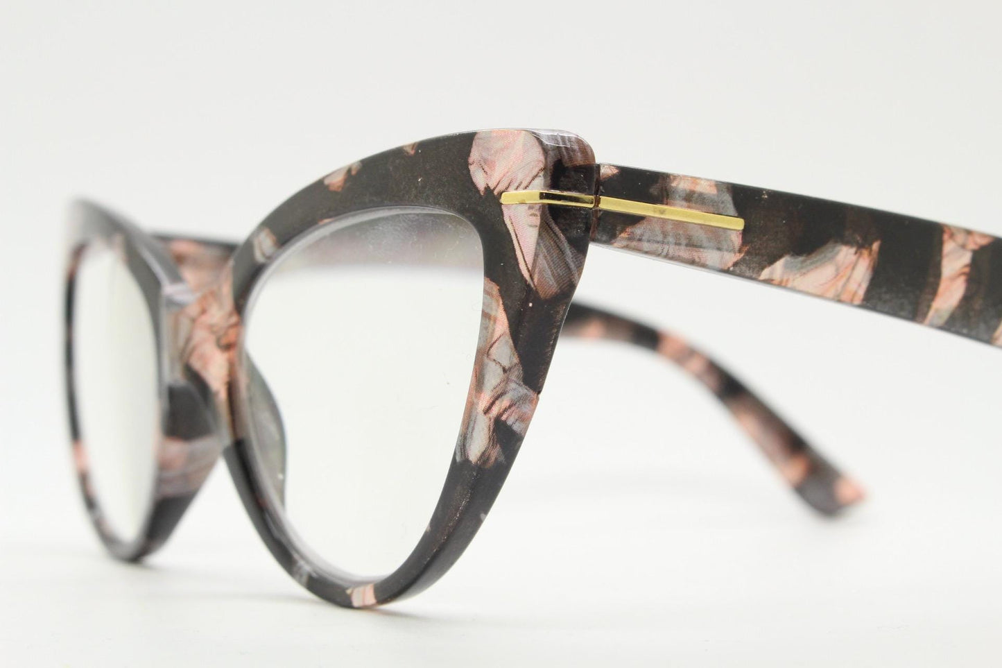 Dynamic pointed cat eye glasses. Transparent chunky cateye optical frame with pink and grey abstract pattern. Vintage Prescription RX