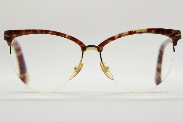 Versace 90s vintage brow line cat eye glasses made in Italy. Elegant tortoise acetate cateye optical half frames. Prescription RX eyeglasses