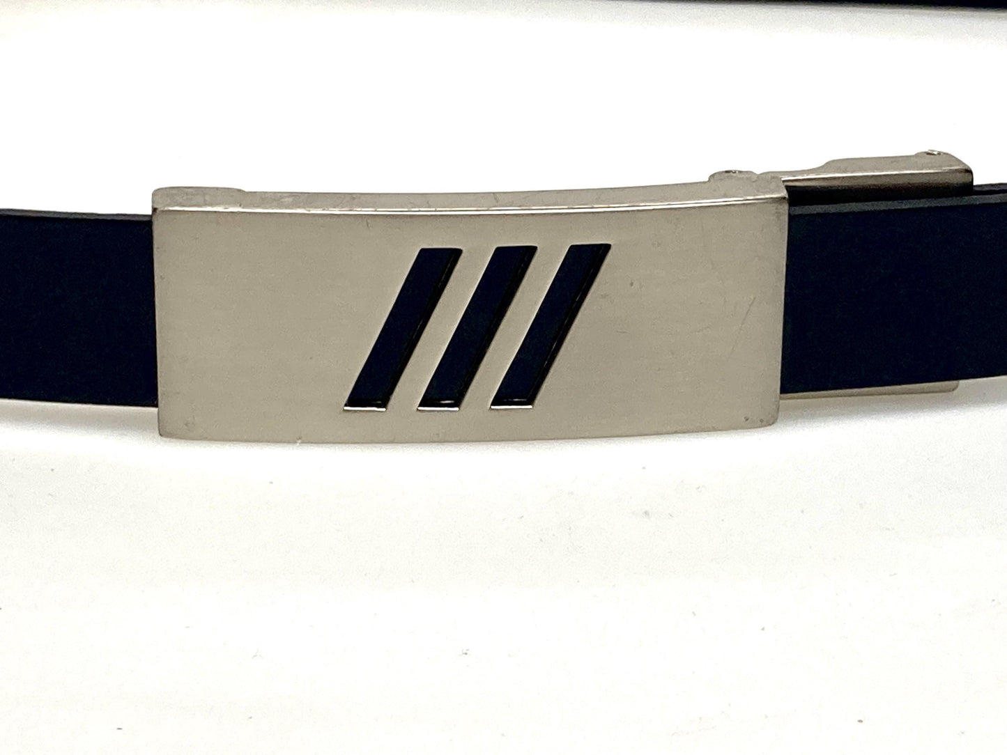 90s vintage smart trouser belt. Thick eco vinyl in black shiny finish with steel buckle with cutouts. Seamless no holes design. Mens NOS