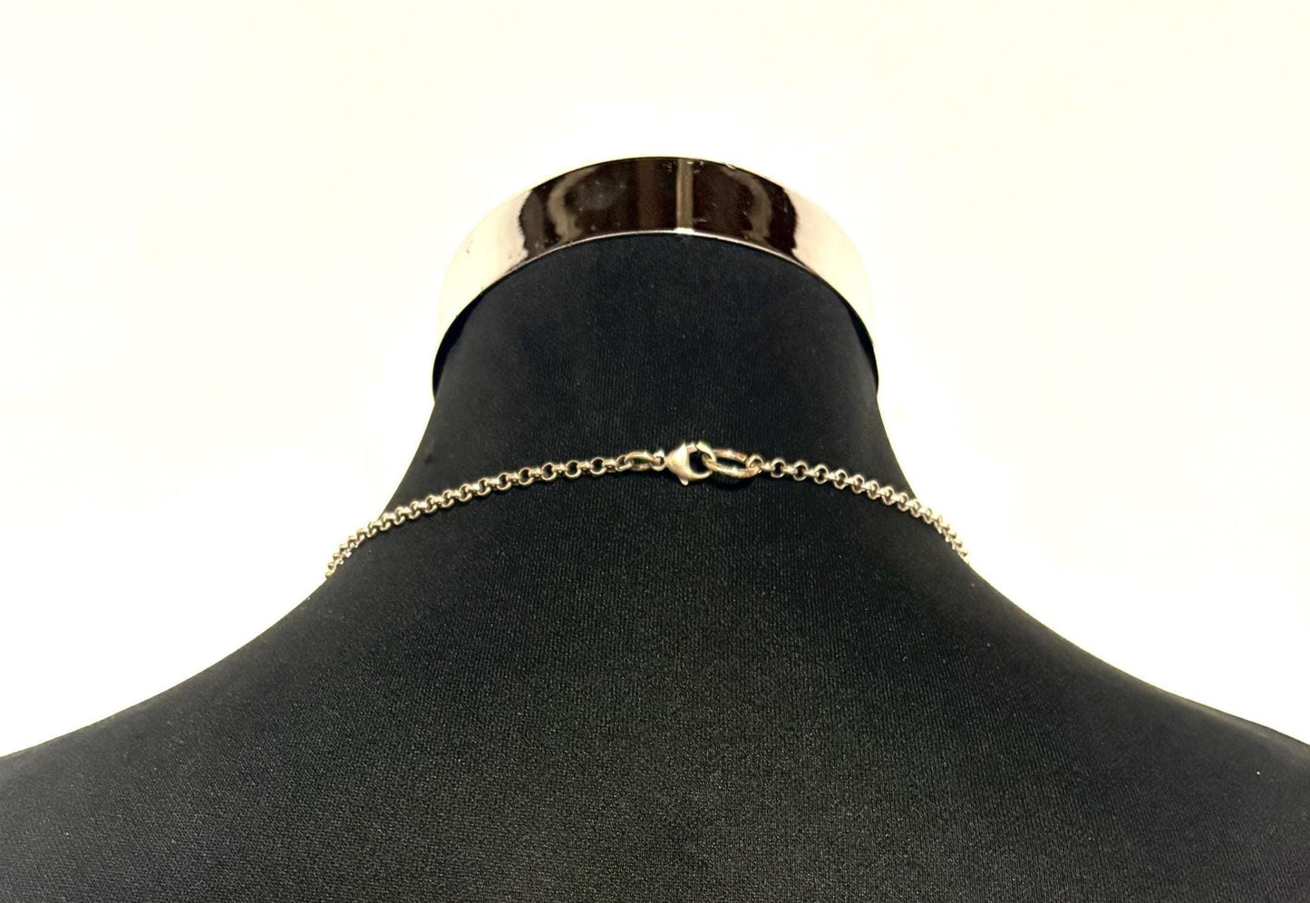 90s vintage Harley Davidson Motorcycles disc pendant necklace. Solid metal silver curved shield with standout skull on adjustable chain