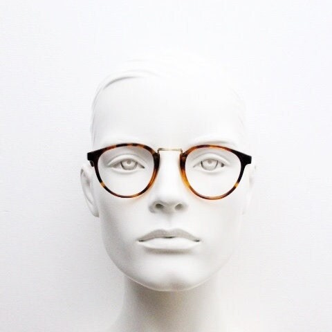 90s vintage round eye glasses. Minimal slim tortoise optical frames with gold bridge. 40s, 50s design prescription eyeglasses. RX spectacles
