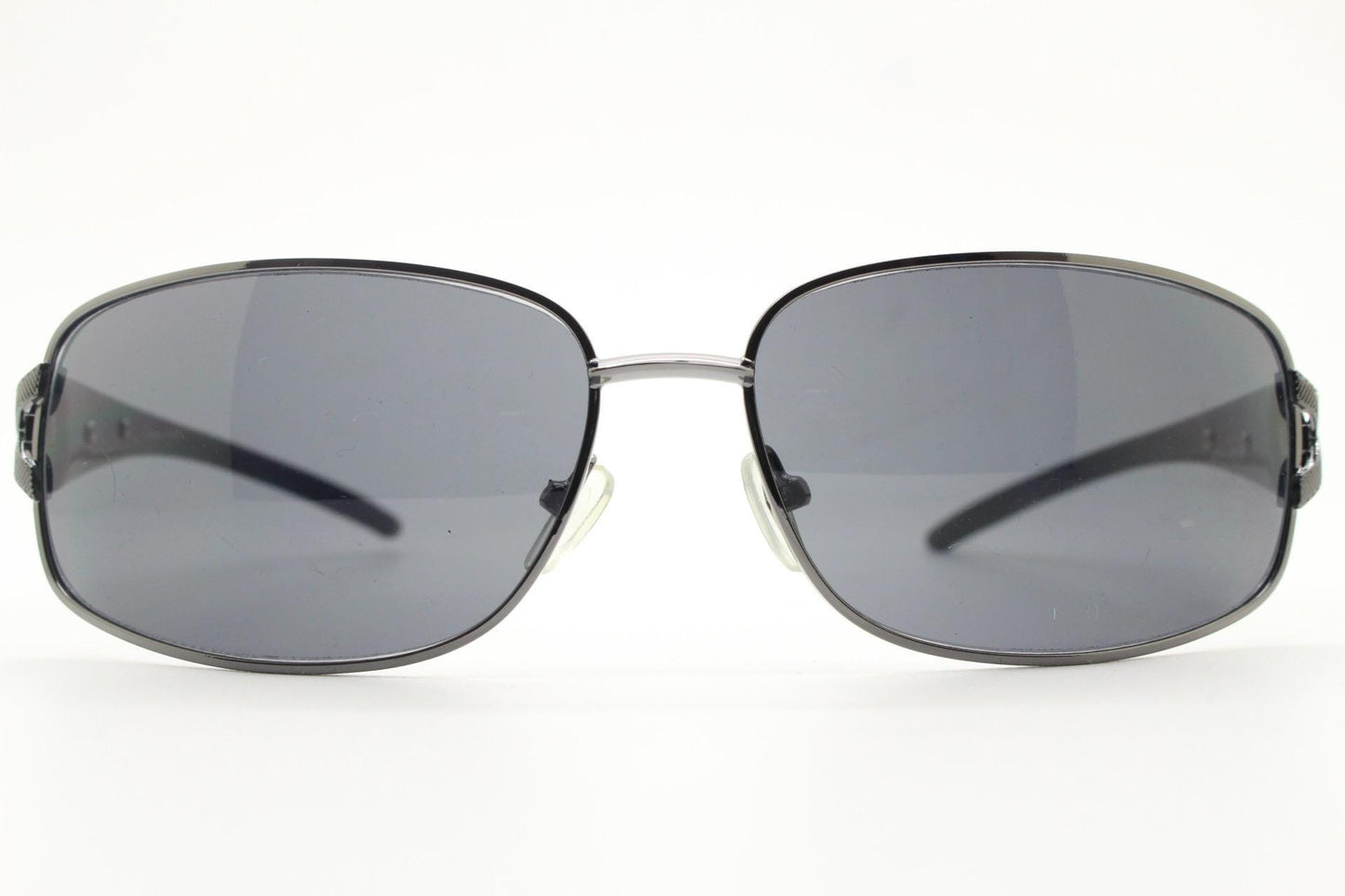 2000s vintage rectangular bug eye sunglasses. Solid metal slightly oversized grey chrome frame with diamond lattice arm detail. Y2K NOS