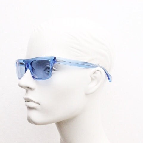 Kaleos rectangular flat top sunglasses. Bright sky blue acetate chunky frame with same colour lenses. BNWOT
