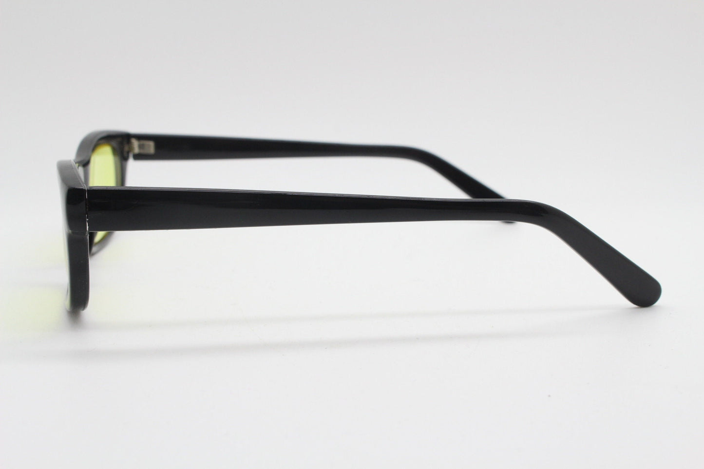 80s vintage rectangular sunglasses. Low profile slim black frame with psychedelic mod light tone canary yellow lenses. BNWT. NOS