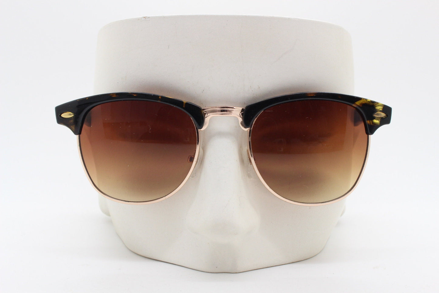 90s vintage browline sunglasses. All time classic design in tortoise gloss with gold half rim. 50s, 60s. Unused NOS