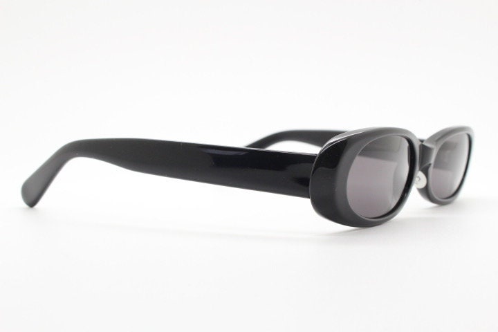 Guess vintage 90s low profile oval sunglasses. All black gloss quality acetate finish. New Old Stock