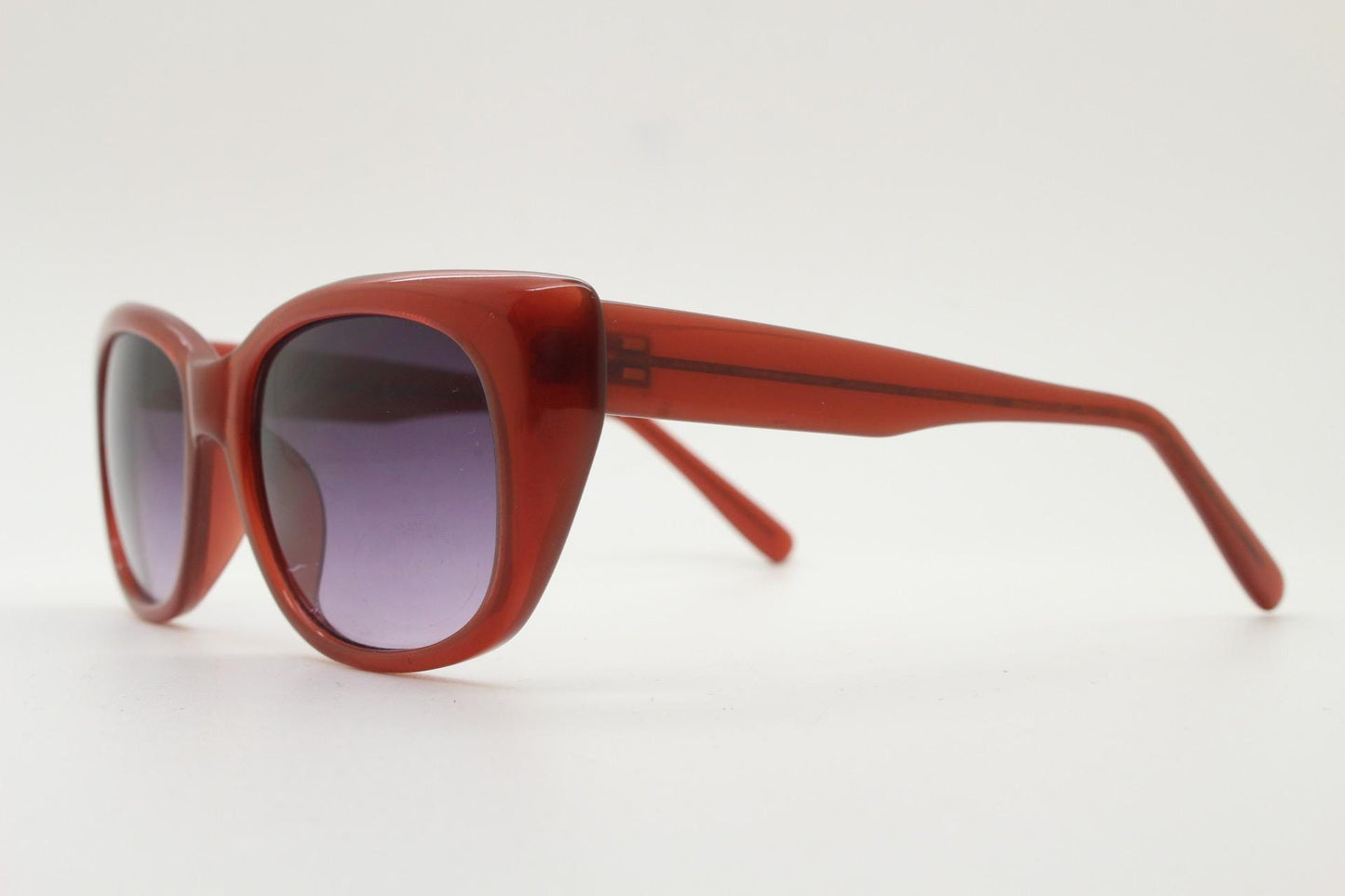Vintage 90s rectangular cat eye sunglasses. Womens transparent brown acetate cateye in sensible proportions with graduating lenses. NOS